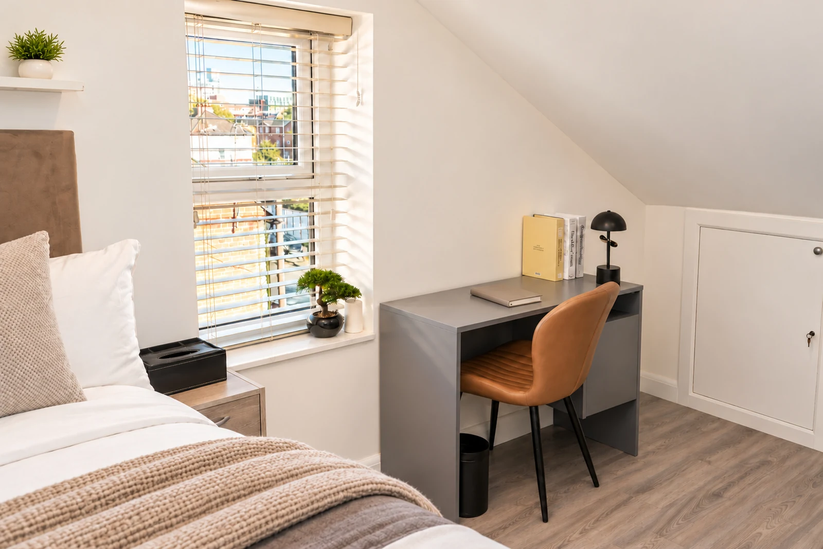 A dedicated desk in Room 5, with fast Wi-Fi and space to plan your day.